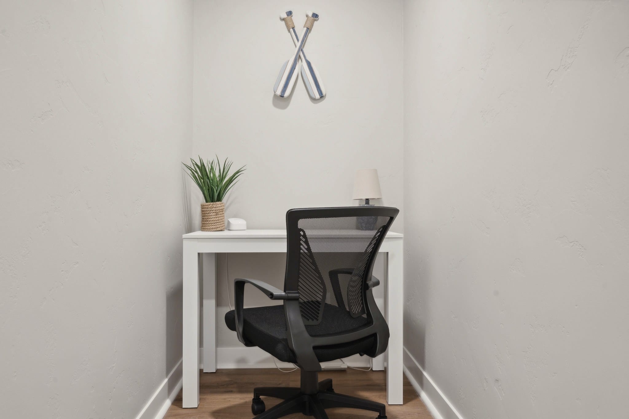 Small desk and office chair at Serenity on Strauss.